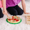 Legemad i træ , pizza med pynt